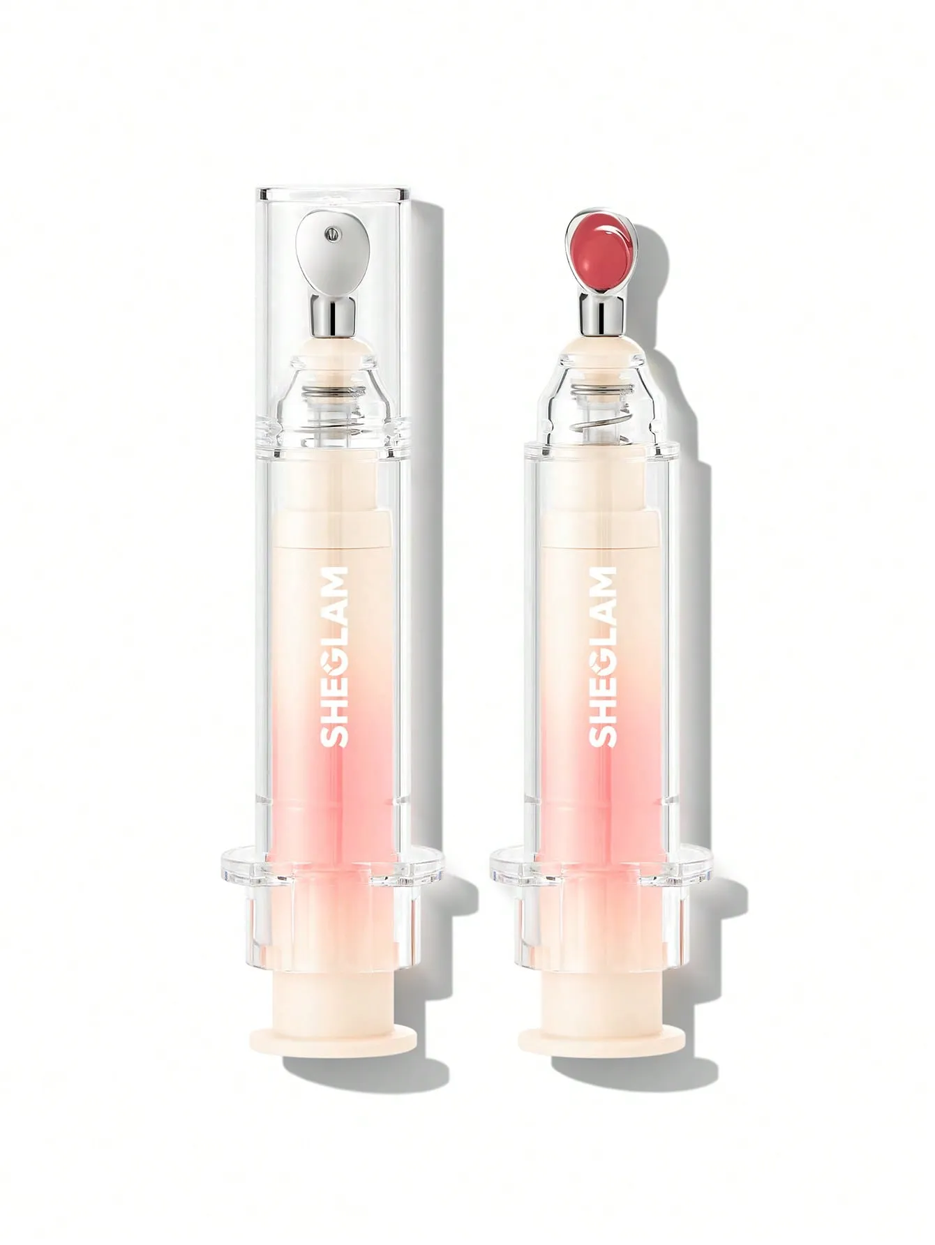 sheglam-booster-shine-plumping-lipgloss-pink-flamingo-masokala.com لیپ گلس حجم دهنده شیگلم رنگ Pink Flamingo