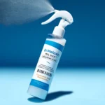 اسپری لایه بردار روشن کننده پا و بدن دکتر ملاکسین Dr.Melaxin مدل Tranexamic Acid و Niacinamide حجم 200 میل